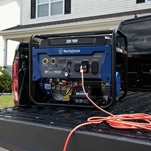 Portable Westinghouse generator on a truck bed with extension cords.