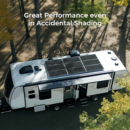 RV with solar panels in a forest setting, highlighting performance in shading.